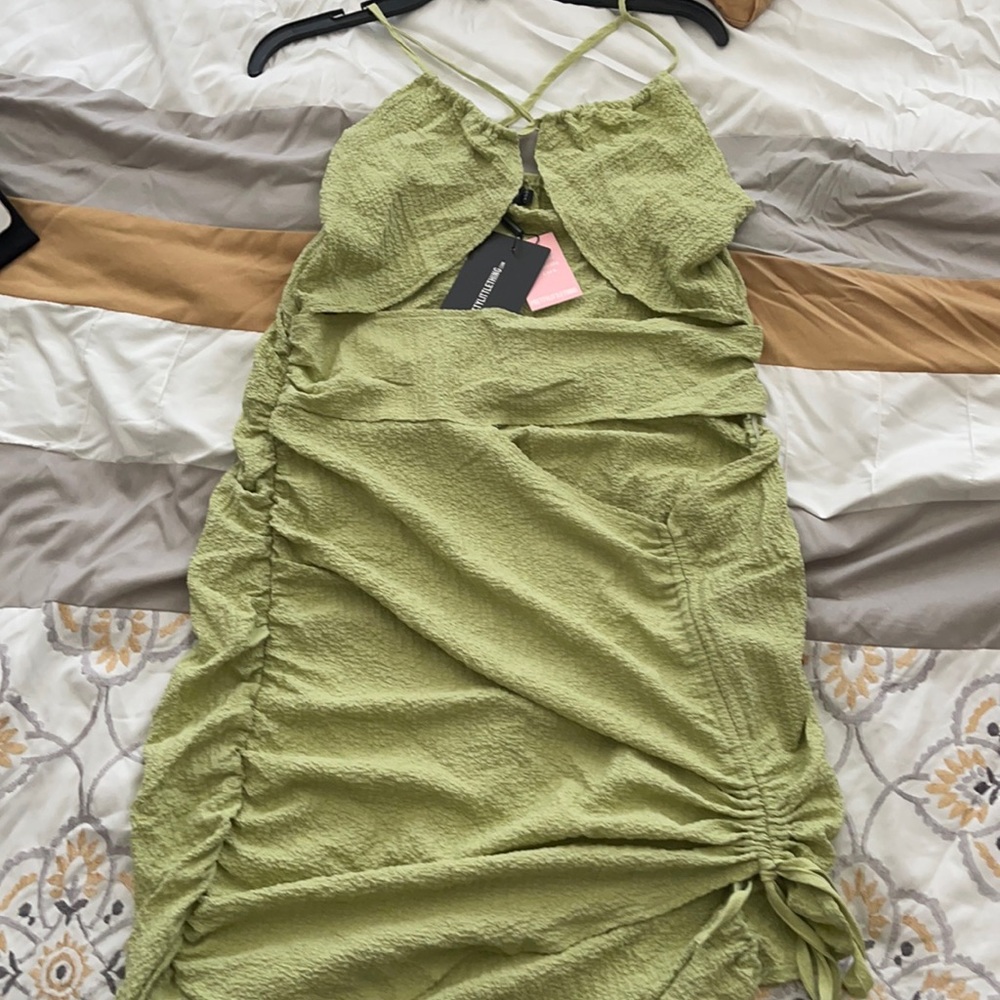 Sage green halterneck ruched bodycon dress